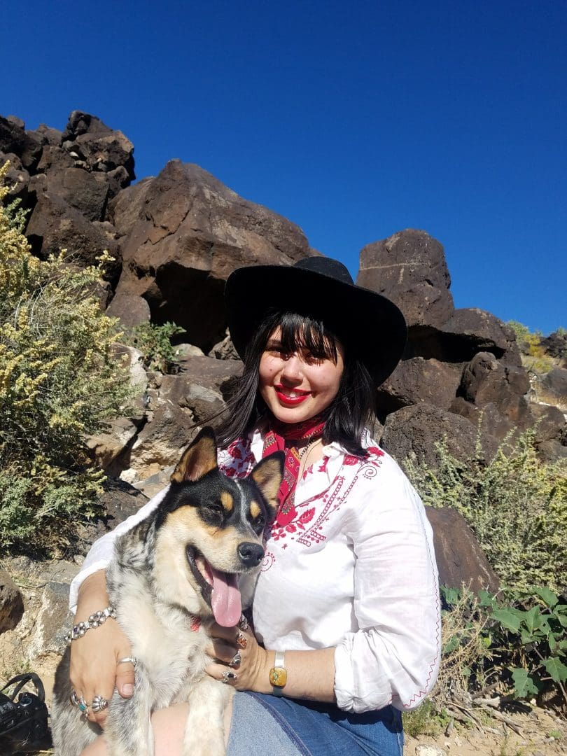 Michelle Ibarra with her dog at Petroglyph National Monument (Michelle Ibarra/WNPA).