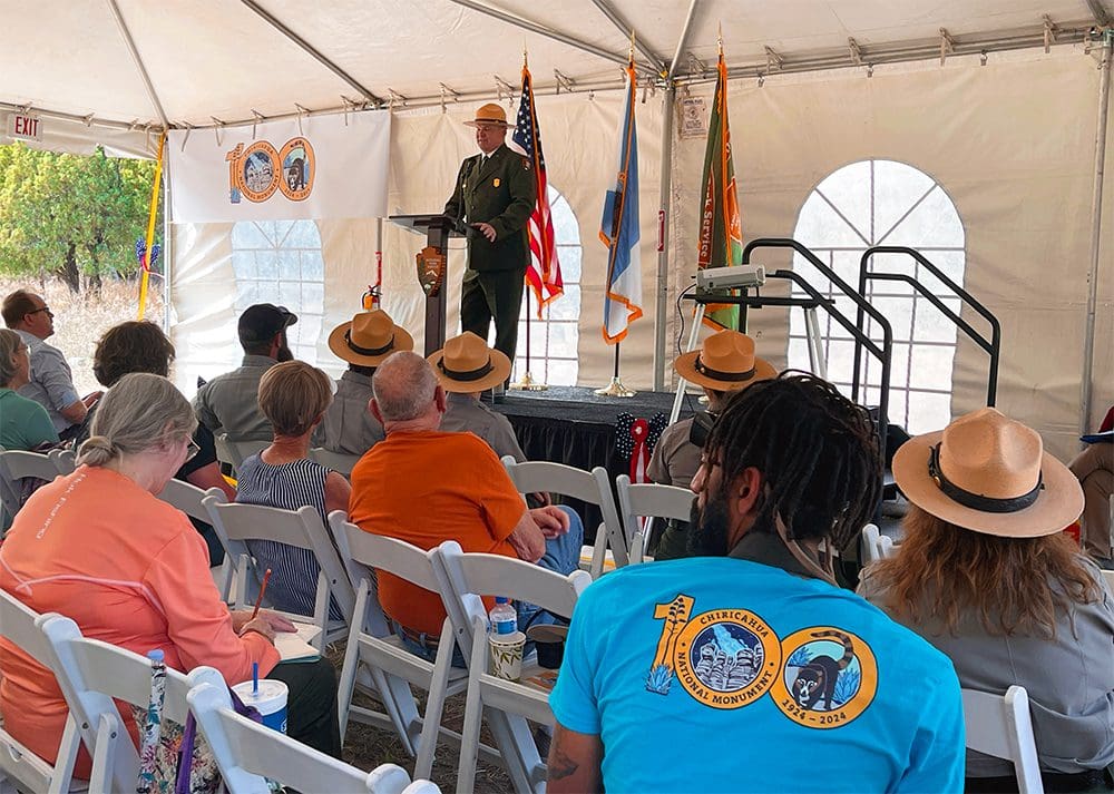 Seated audience with NPS superintendent at the podium.