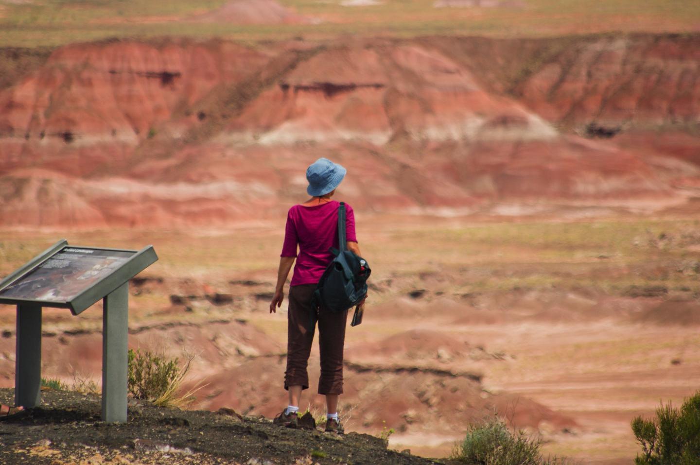 Hiker begins an adventure at the Painted Desert Visitor Center