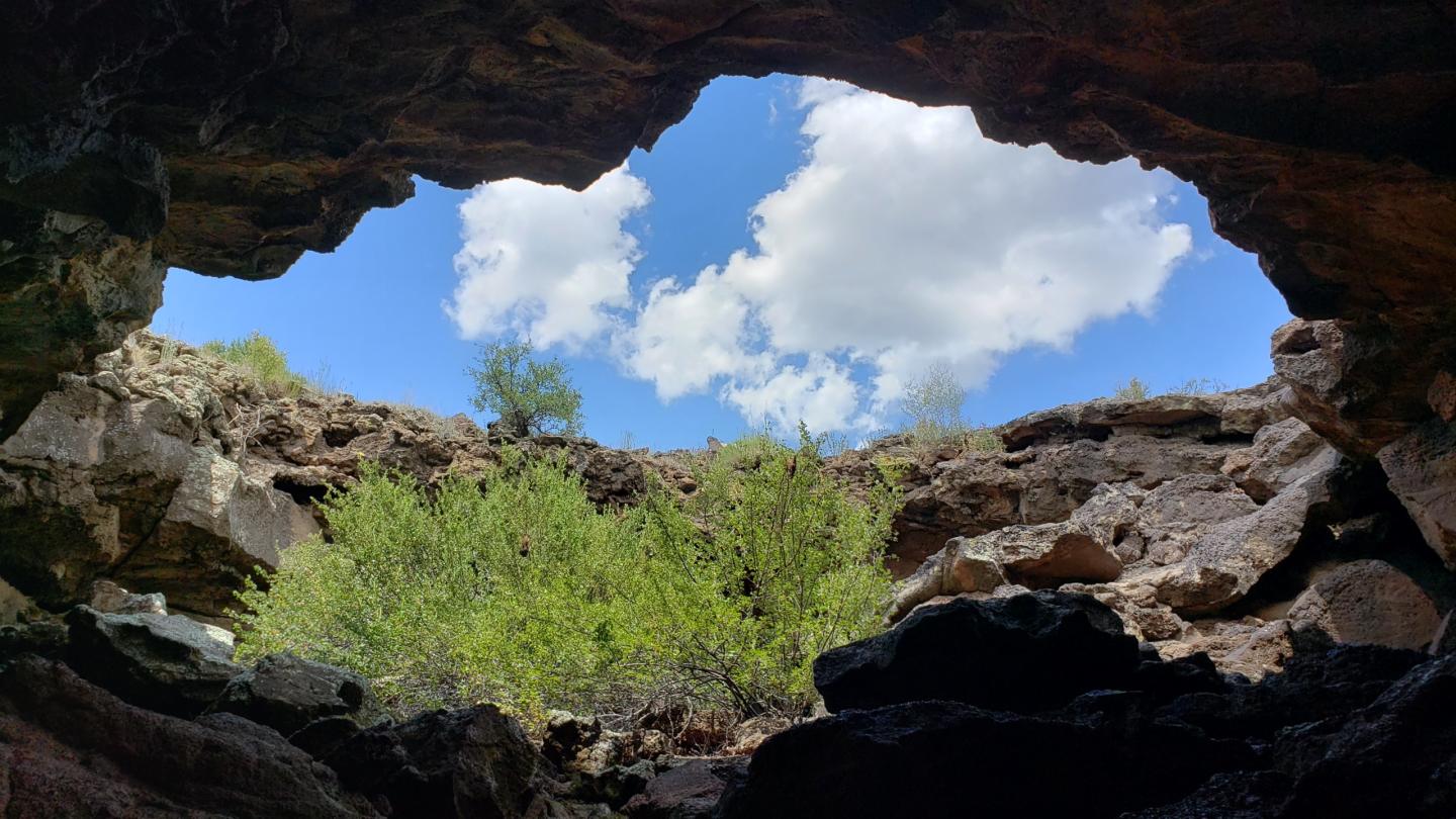 Sky view from the bottom of a lava tube