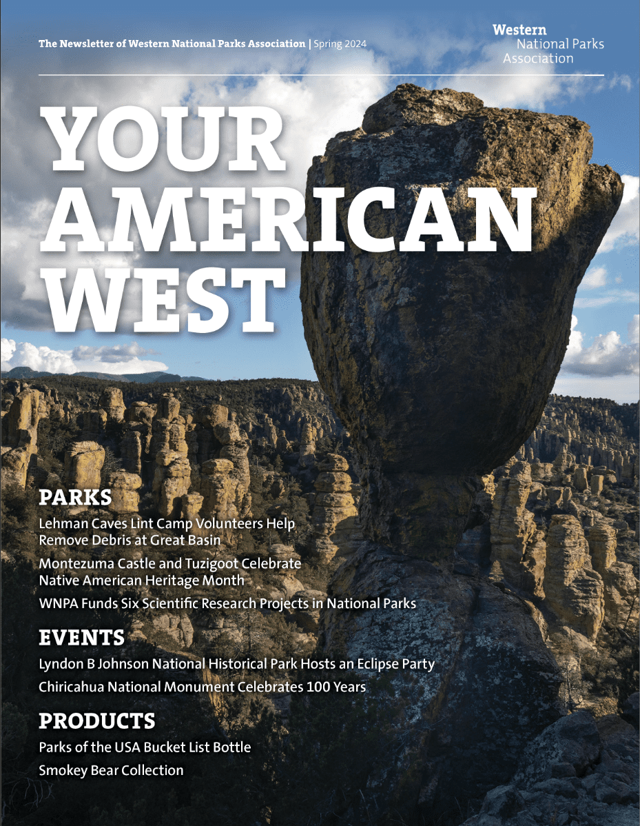 Rock formations under a partly cloudy sky with text overlay.