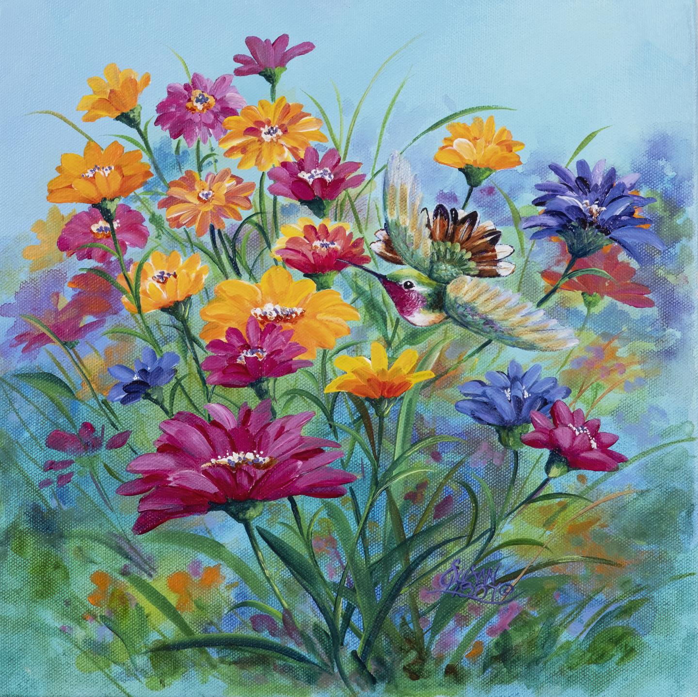 Colorful hummingbird and flowers in a vibrant field.