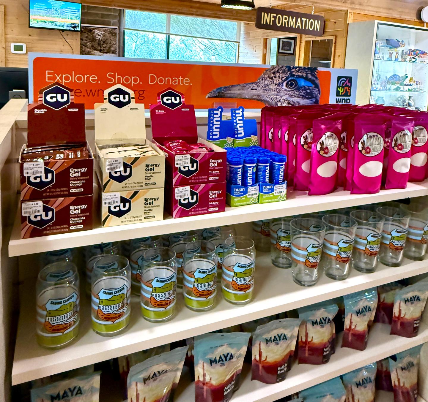 Shelves stocked with energy gels, drinks, and snacks in the Sabino Canyon store, operated by Western National Parks.