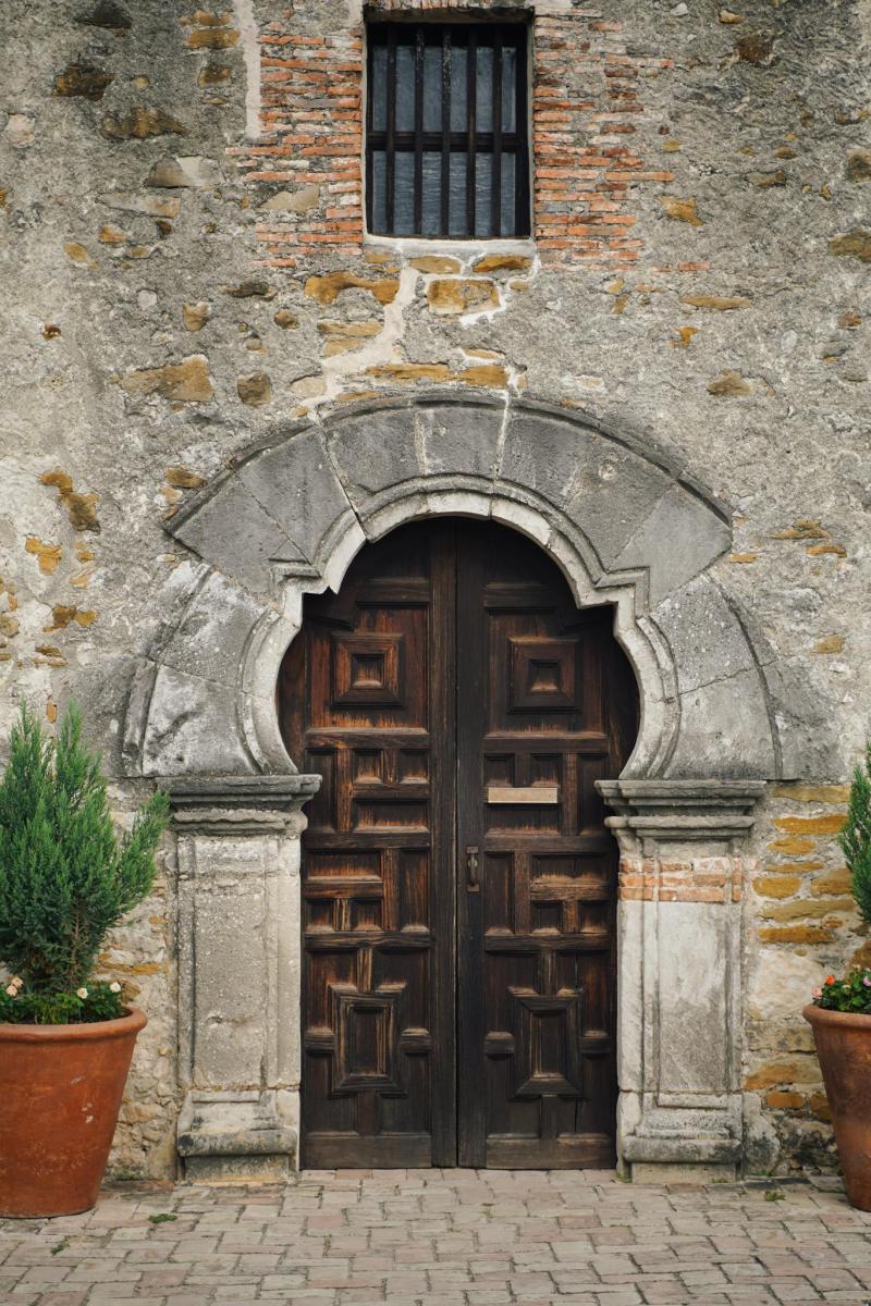 stone doorway and wooden door