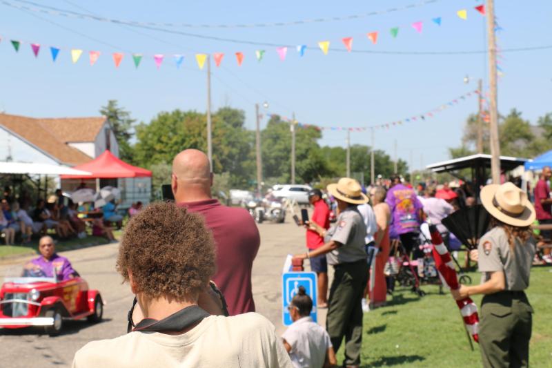A group people watching a parade