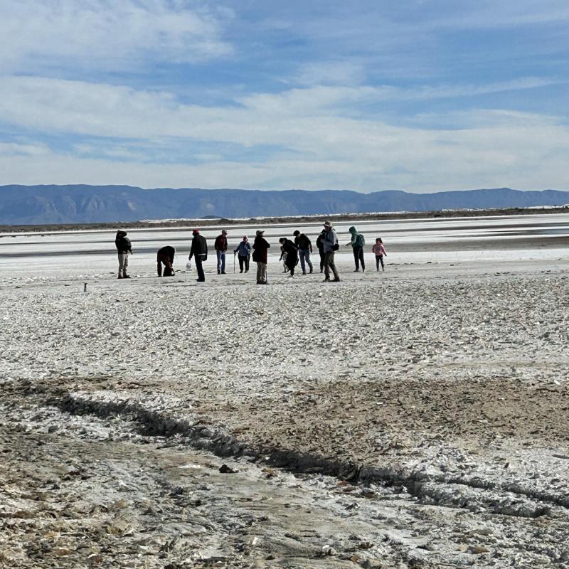 A tour group on the lakebed of Lucero