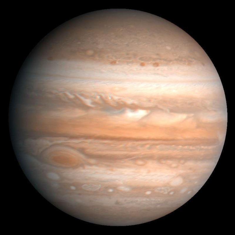 View of Jupiter from the Voyager 2 spacecraft, showing the planet's dark bands of swirling clouds.