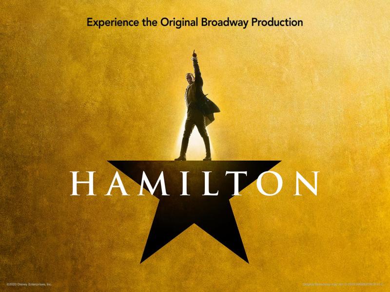 A graphic of a silhouette of a man with a raised hand standing on an star shaped platform.