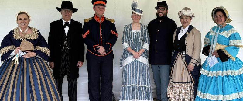 A group of costumed living history interpreters.